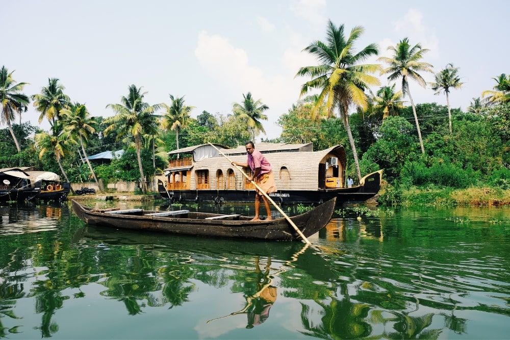 Canal boat being rowed along the river