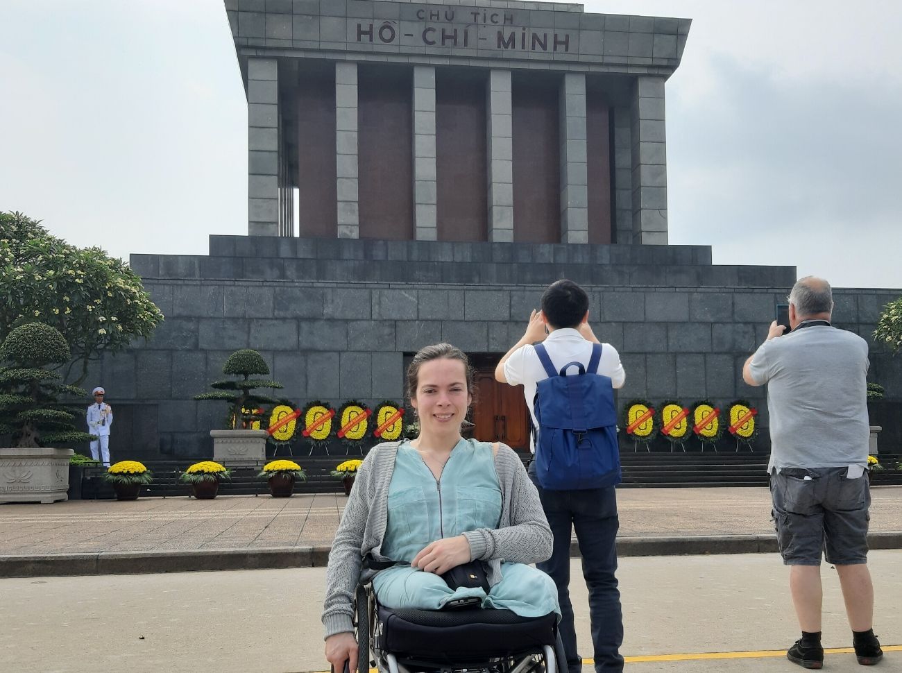 Wheelchair user in front of the Ho Chi Minh mausoleum